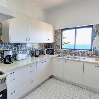 Algar Seco Parque | Carvoeiro, Algarve | white kitchen with portuguese tiles